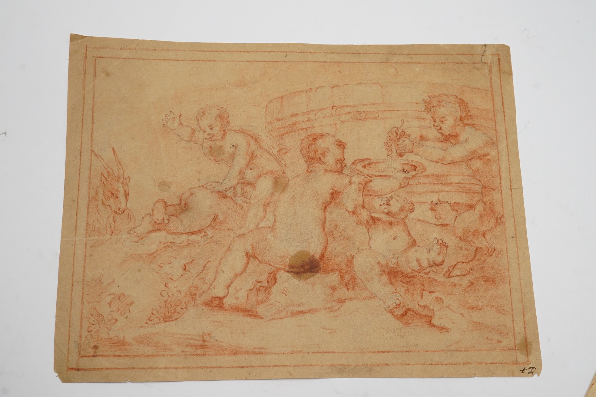 Four Old Master sanguine chalk and watercolours on buff paper, including figure tying a shoe, Putti and a study of a semi-nude reclining woman, largest 17.5 x 23cm, unframed. Condition - fair, considering age